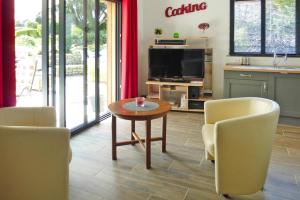 Maisons de vacances Holiday Home, Neville-sur-Mer : photos des chambres