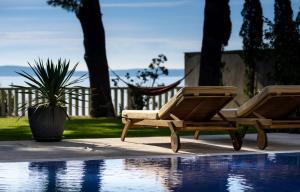 Luxury Seafront Villa Castello Split with heated pool, jacuzzi and sauna at the beach in Split