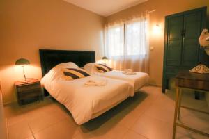 Appartements Bella, Jacuzzi Partage & Parking avec Borne de Recharge Voiture Electrique : photos des chambres