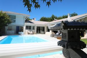 Maisons de vacances La Maison Blanche de Lanton : photos des chambres