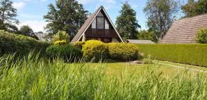 Ferienhaus "Lütte Perle am Deich" - Hoddersdeich