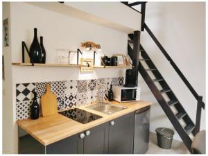 Appartements Studio Champagne : photos des chambres