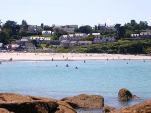 Appartements Grand LARGE FACE A LA PLAGE TRESTEL : photos des chambres