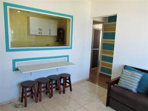 Apto pé na areia com vista para o mar e Wifi