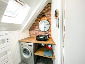 Appartements L’INDUSTRIEL en centre ville sur rive du TRIEUX : photos des chambres