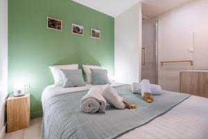 Appartements LES HORTILLONNAGES_B&B INN_Centre ville_Terrasse_Wifi_Netflix : photos des chambres