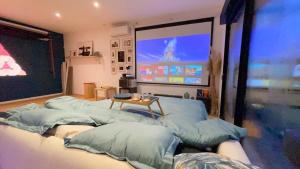 Appartements Capsule Nature & Photos - Jacuzzi - Netflix & Home cinema - PS5 & jeu : photos des chambres