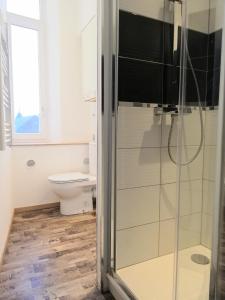 Appartements De 2 a 6 personnes - Le Street'Art - CROISEE DES PARCS - A 20 minutes de Center Parc et Parc Animalier Sainte-Croix - Netflix - Wifi : photos des chambres