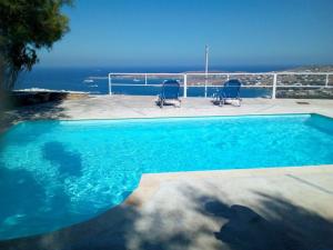 Semi-detached house on the heights of Parikia - Exceptional view of the Cyclades