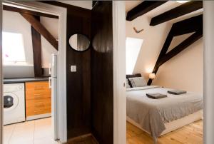 Sunny mansard in the heart of Old Town