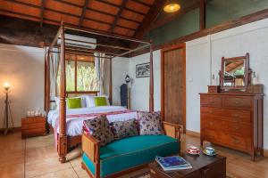 Aranyam Villa by StayVista with Modern wooden interiors, Kidszone, Indoor games & plunge pool