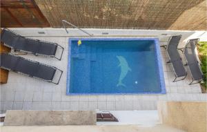 Amazing home in Komiza with 4 Bedrooms WiFi and Outdoor swimming pool