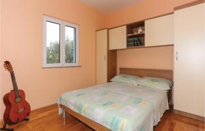 Three Bedroom Holiday Home in Kastel Stafilic