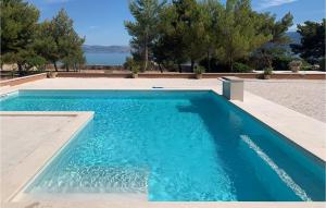 Nice Home In Supetar With Wifi, Private Swimming Pool And Outdoor Swimming Pool