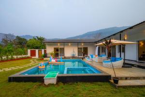 SaffronStays Turquoise Maison - 3BR pool villa with jacuzzi, bonfire & fruit garden near Lake Kalote, Karjat