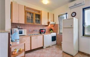 Apartment Fazana with Fireplace 03