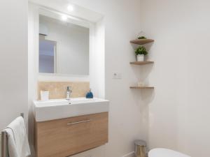 Appartements Au confort du port roannais : photos des chambres