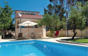 Nice Home In Banjol With 2 Bedrooms, Wifi And Outdoor Swimming Pool