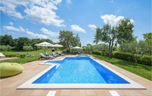 Two-Bedroom Holiday Home In Tinjan