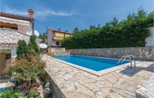 Amazing Home In Labin With 5 Bedrooms, Jacuzzi And Outdoor Swimming Pool