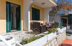 Three-Bedroom Apartment In Rogoznica