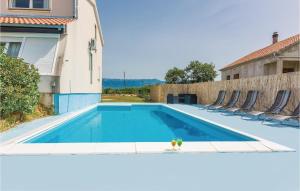 Nice Home In Rupalj With 4 Bedrooms, Wifi And Outdoor Swimming Pool