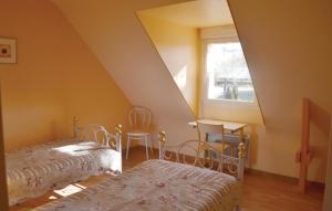 Maisons de vacances Nice home in Guehenno with 3 Bedrooms and WiFi : photos des chambres