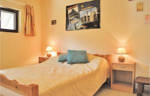 Maisons de vacances Three-Bedroom Holiday Home in Calcatoggio : photos des chambres
