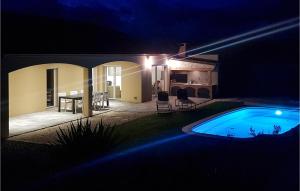 Maisons de vacances Nice home in Quarante with 3 Bedrooms, WiFi and Outdoor swimming pool : photos des chambres