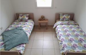 Maisons de vacances 3 Bedroom Nice Home In Quarante : photos des chambres
