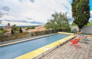 Maisons de vacances Nice home in Thezan-les-Bziers with 4 Bedrooms and Outdoor swimming pool : Maison de Vacances 4 Chambres