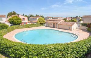 Maisons de vacances Stunning home in Aigues-Mortes with Outdoor swimming pool, WiFi and 3 Bedrooms : photos des chambres