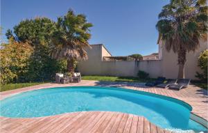 Maisons de vacances Amazing home in Aigues-Mortes with 4 Bedrooms, WiFi and Outdoor swimming pool : photos des chambres