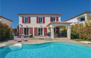 Maisons de vacances Amazing home in Aigues-Mortes with 4 Bedrooms, WiFi and Outdoor swimming pool : photos des chambres