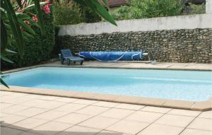 Maisons de vacances Amazing home in Escos with 4 Bedrooms and WiFi : photos des chambres