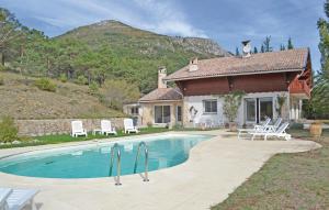Amazing home in La Bastide with 5 Bedrooms and Outdoor swimming pool