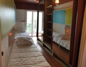 Appartements Un appartement avec acces plage a Saint Gilles vue mer comme sur un bateau : photos des chambres