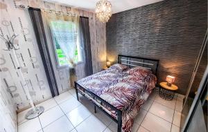 Maisons de vacances Two-Bedroom Holiday Home In St Michel Chef Chef : photos des chambres