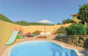 Awesome apartment in Gonnesa w/ WiFi, Outdoor swimming pool and 1 Bedrooms