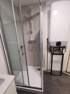 Appartements Le rez de jardin : photos des chambres