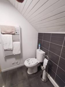 Appartements Le rez de jardin : photos des chambres