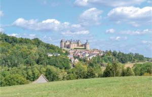 Maisons de vacances Three-Bedroom Holiday Home in Bassillac : photos des chambres