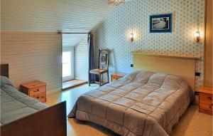 Maisons de vacances Beautiful Home In Clohars Carnoet : photos des chambres