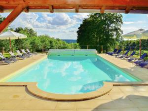 Maisons de vacances Holiday Home in Oradour sur Vayres with Private Terrace : photos des chambres