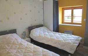 Maisons de vacances Amazing home in Pleudihen sur Rance with 3 Bedrooms and WiFi : photos des chambres