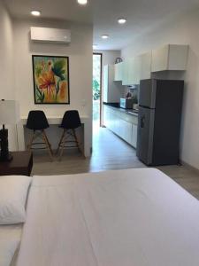 Estudio en Puerto Aventuras, Condominio con Alberca # 202