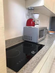 Estudio en Puerto Aventuras, Condominio con Alberca # 202