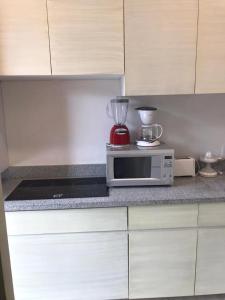 Estudio en Puerto Aventuras, Condominio con Alberca # 202