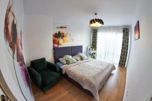 ApartamentyPrzyMorzu Bałtycki z miejscem postojowym i ogródkiem