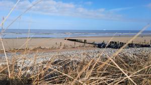 Maisons de vacances Gite galets et bois flottes proche mer gold beach meuble de tourisme 4 etoiles : photos des chambres